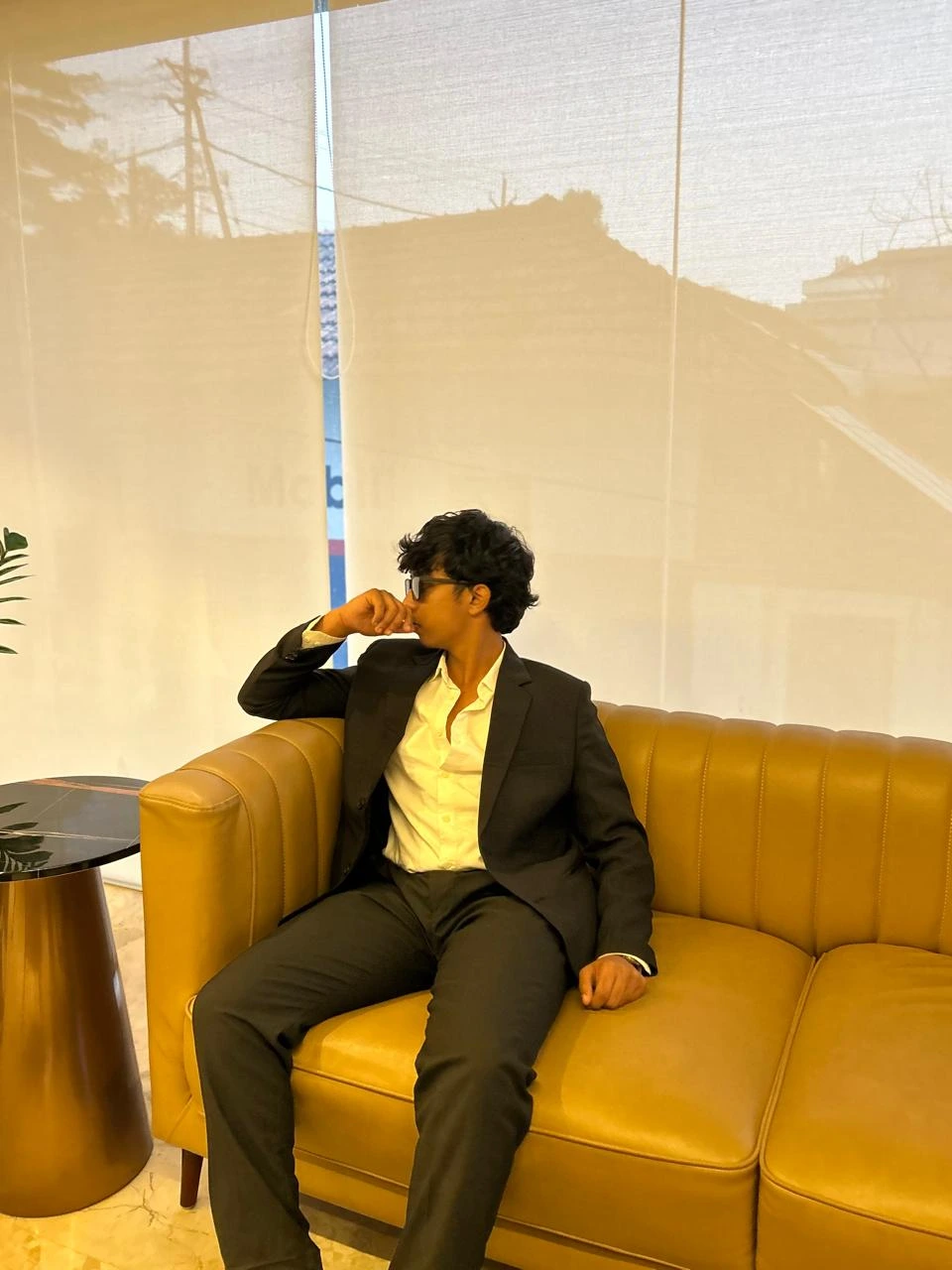 a man sitting on sofa digital marketing consultant in wayanad